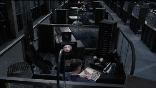 [Winston au Ministère de la Vérité]